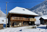 Maison sous la neige